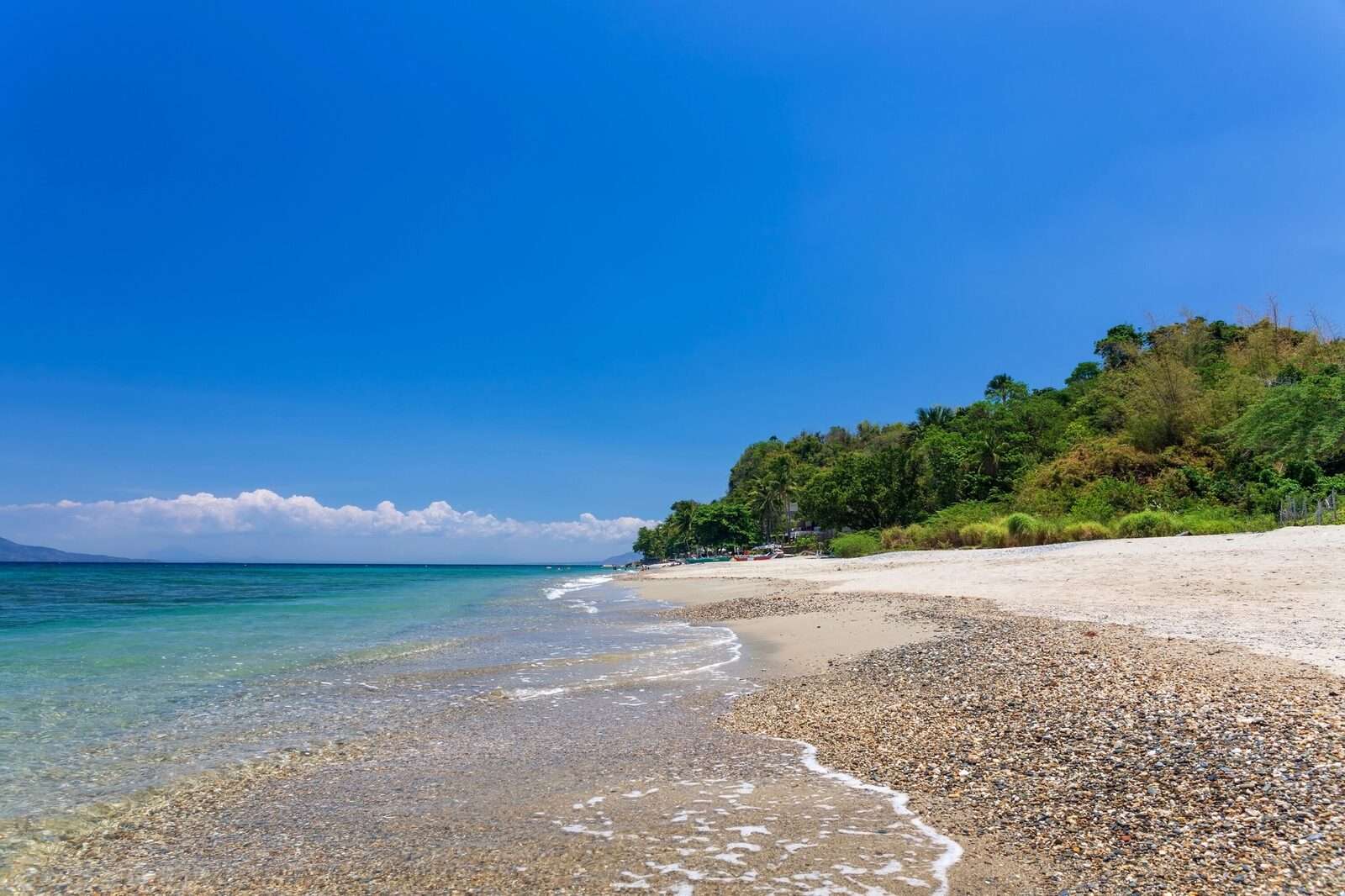 Quiet sand at Aninuan Beach, Puerto Galera